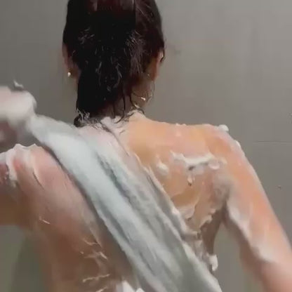 Serviette de douche exfoliante